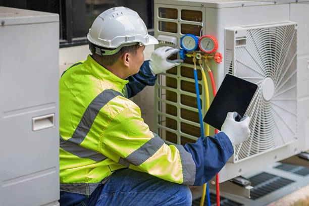 Professional Heat Pump Repair technician working in Maysville, AR